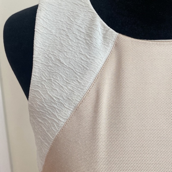 Classy black, cream and white dress. Form fitting and zipper is in back. Lovely! - Picture 2 of 7